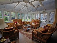 Relax in the spacious and light conservatory